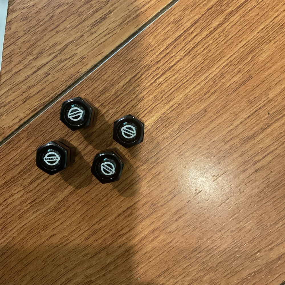 Nissan Black Tire Valve Caps 4pc